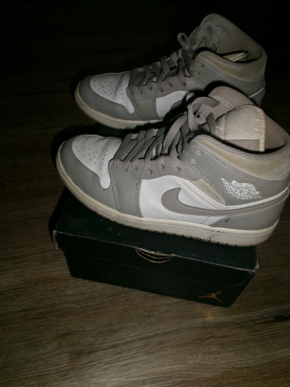 Jordan women’s High-Top Sneakers in Grey and White